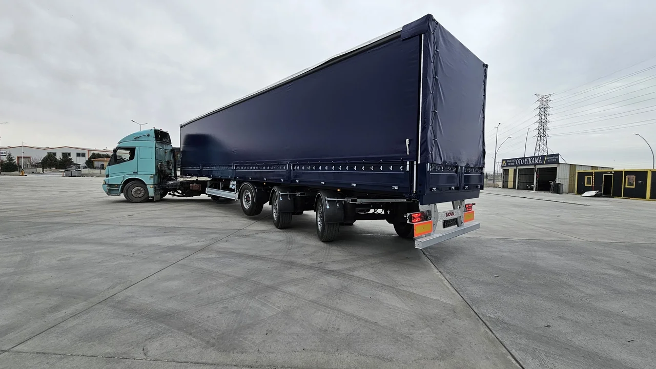 MECHANIC STEERING CURTAINSIDER TRAILER